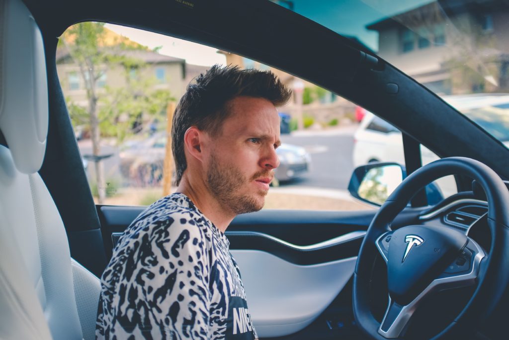 a man sitting in a car