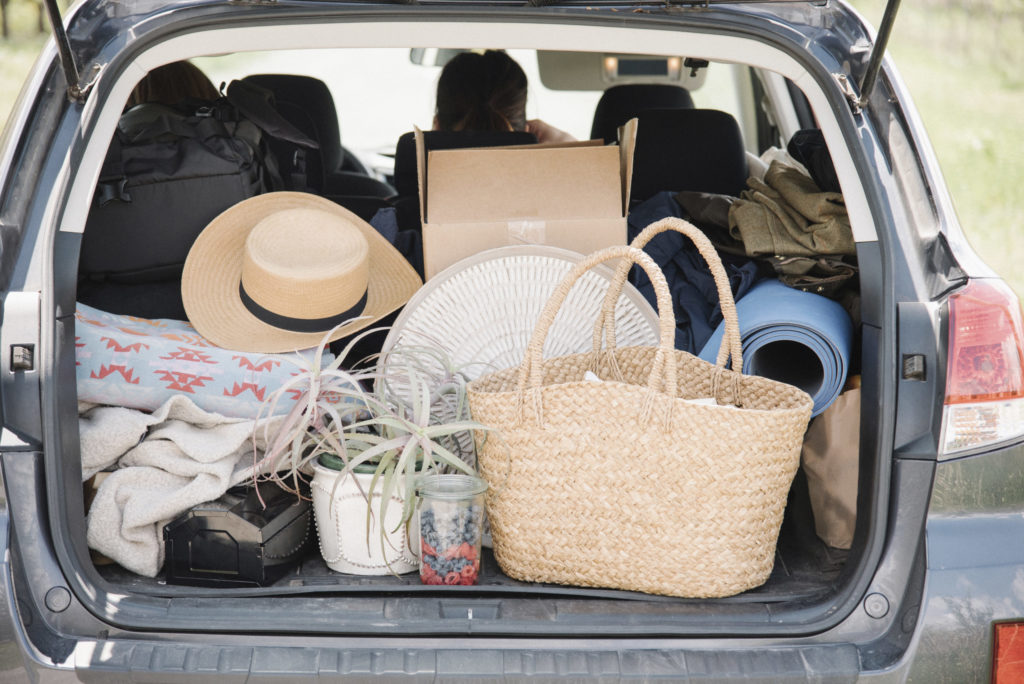 a car trunk full of bags