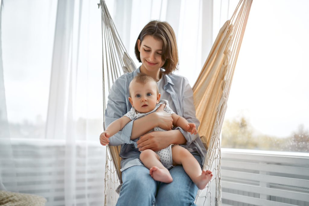 a person holding a baby